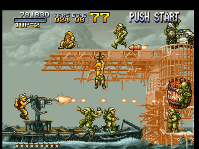 Metal Slug: Super Vehicle - 001 (PlayStation) screenshot: A big platform are blocking Marco Rossi's crossing: he starts to use the machine-gun to demolish it!