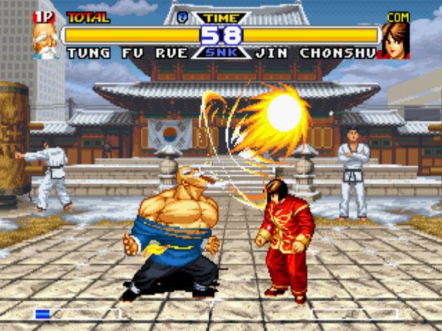 Real Bout Garō Densetsu Special: Dominated Mind (PlayStation) screenshot: Tung Fu Rue uses his projectile-based move Spit Fireball against Chonshu, but she's about to avoid it!