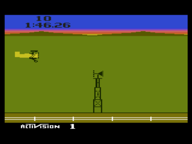 A Collection of Activision Classic Games for the Atari 2600 (PlayStation) screenshot: Your task: fly through a set number of barns in the shortest amount of time possible (Barnstorming).