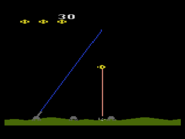 A Collection of Activision Classic Games for the Atari 2600 (PlayStation) screenshot: Controlling an intergalactic spacecraft, you task is to destroy enemy ground forces (Laser Blast).