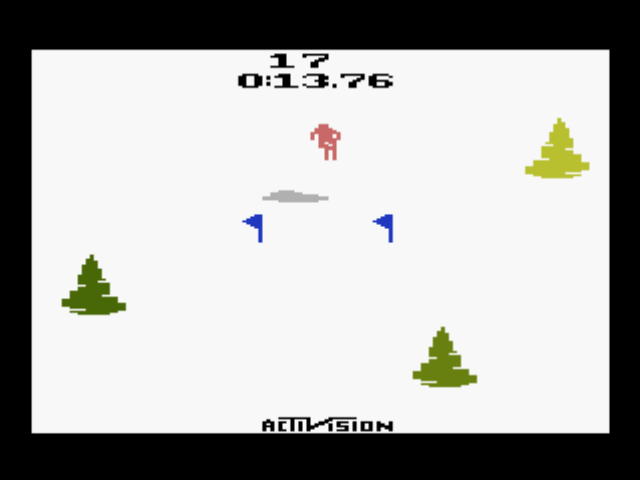 A Collection of Activision Classic Games for the Atari 2600 (PlayStation) screenshot: Your goal is to ski to the bottom of a treacherous mountain in the shortest time possible (Skiing).
