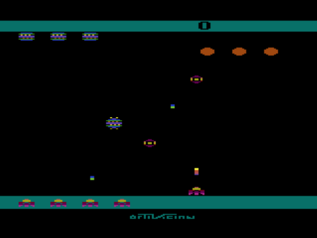 A Collection of Activision Classic Games for the Atari 2600 (PlayStation) screenshot: A bug blaster defending the three pieces of fruit at the top right of the screen (Spider Fighter).