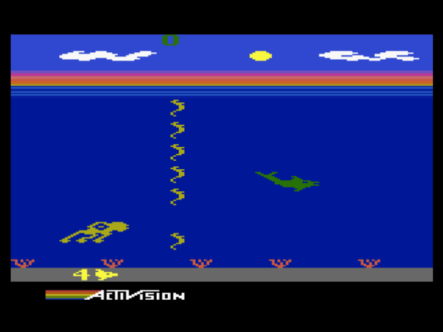 A Collection of Activision Classic Games for the Atari 2600 (PlayStation) screenshot: A dolphin chased by a squid: you must earn points by staying alive as long as possible (Dolphin)!