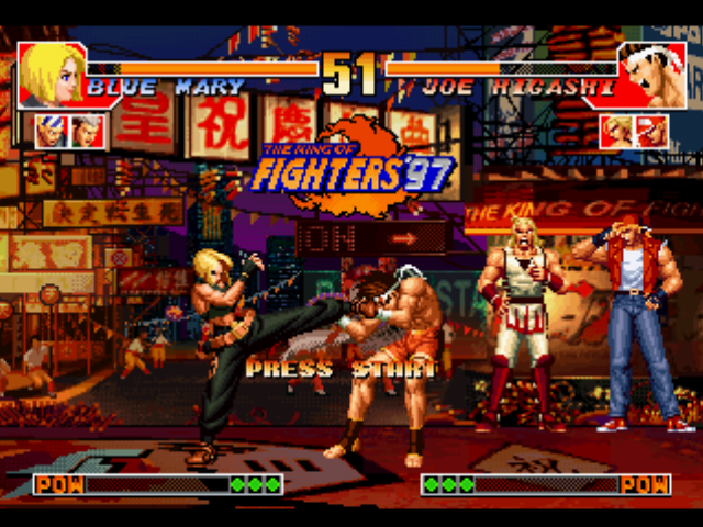 The King of Fighters '97 (PlayStation) screenshot: Demonstration battle in progress: Blue Mary gets to hit-damage Joe Higashi with a kickin' offensive!