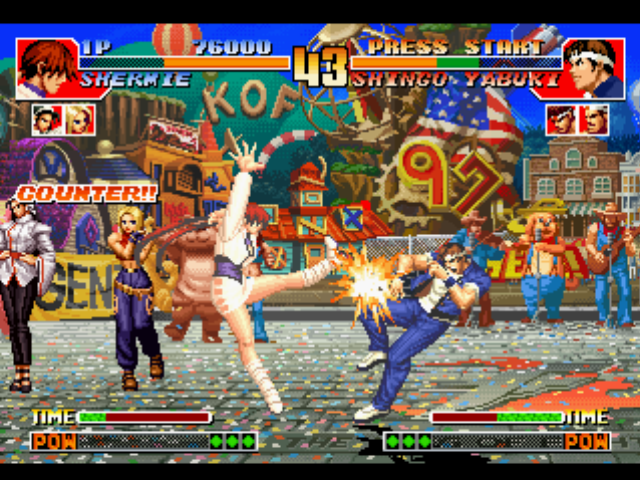 The King of Fighters '97 (PlayStation) screenshot: Shermie counter-hit-damages Shingo Yabuki using the accurate performance of her move Axle Spin Kick.