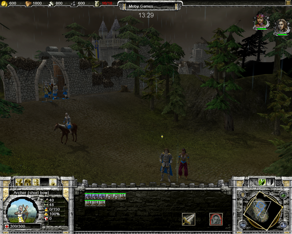 Castle Strike (Windows) screenshot: Here is Thibaut and his soldiers getting ready for a rain-soaked battle.