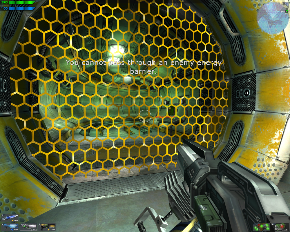 Tribes: Vengeance (Windows) screenshot: These hexagons mean that you cannot pass. Larger and fainter versions of these envelop the play area in the outdoor levels.