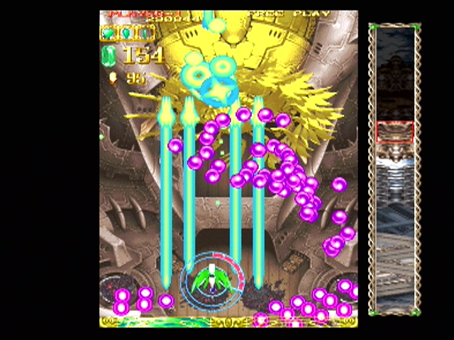 Espgaluda (PlayStation 2) screenshot: Attacking an end of level boss