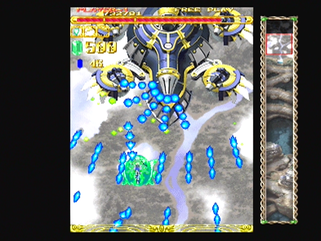 Espgaluda (PlayStation 2) screenshot: Use the barrier to defend from attacks
