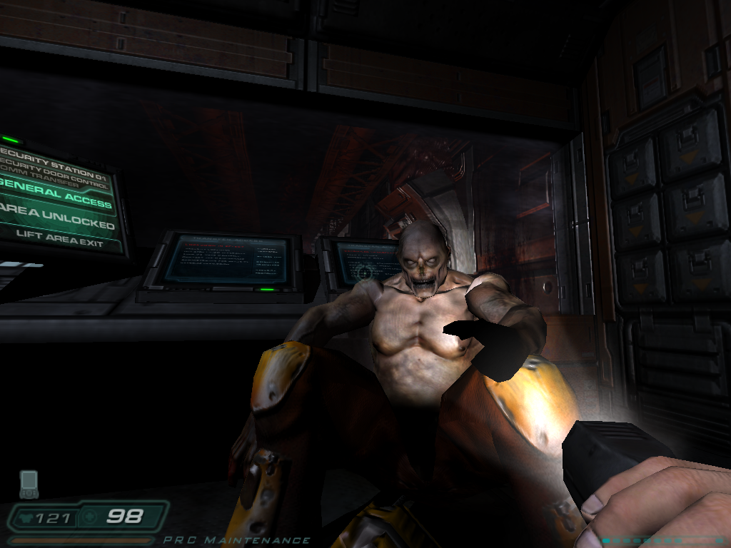 Doom³ (Windows) screenshot: A Chainsaw Zombie that just wants to shake hand with you.