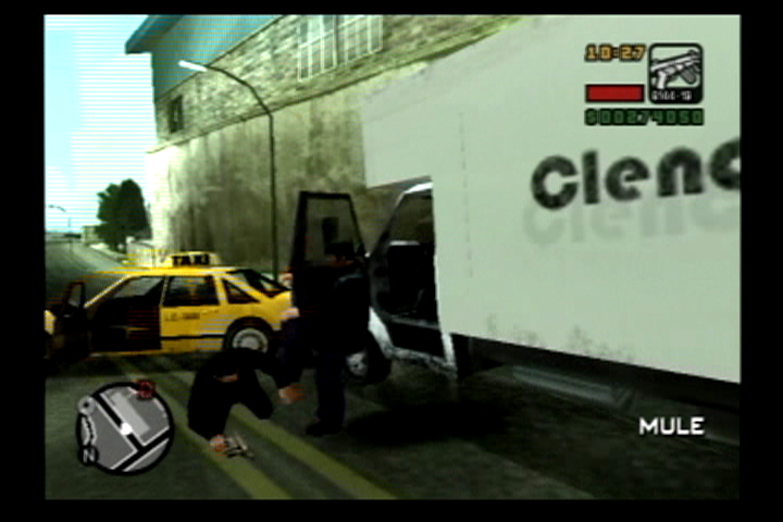 Grand Theft Auto: Liberty City Stories (PlayStation 2) screenshot: Sometimes fiesty drivers want their vehicle back and are willing to fight for it.