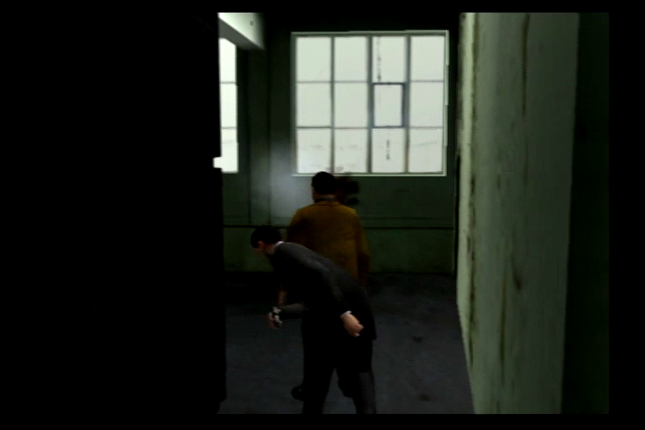 The Getaway (PlayStation 2) screenshot: Quietly whack someone from behind to avoid attention.