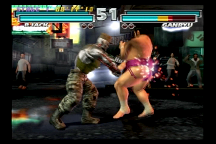 Tekken Tag Tournament (PlayStation 2) screenshot: Ganryu will be feeling those metal fists to the kidneys in the morning.