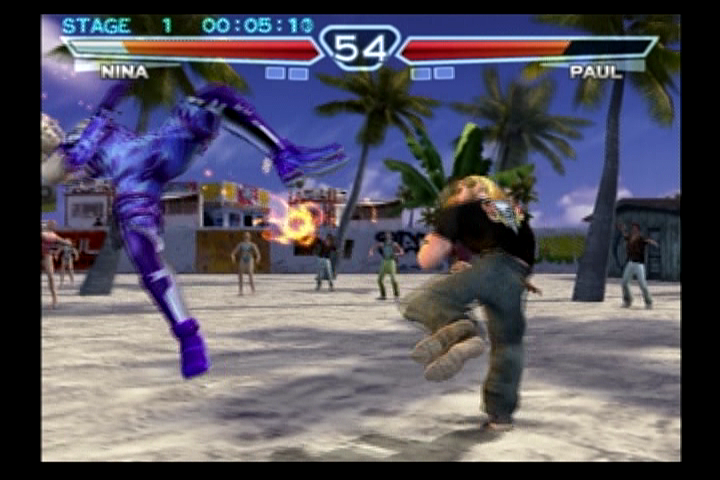 Tekken 4 (PlayStation 2) screenshot: Paul giving Nina the business.