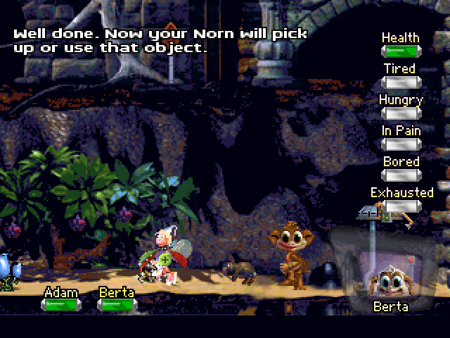 Creatures (PlayStation) screenshot: Teaching it to grab something.