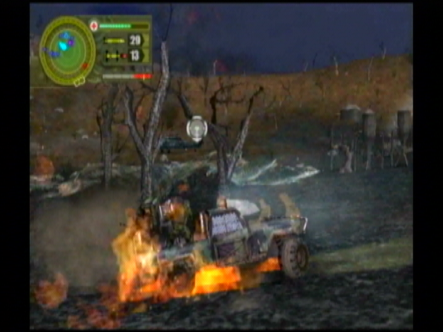 Reign of Fire (GameCube) screenshot: A flaming jeep makes it out of a forest.
