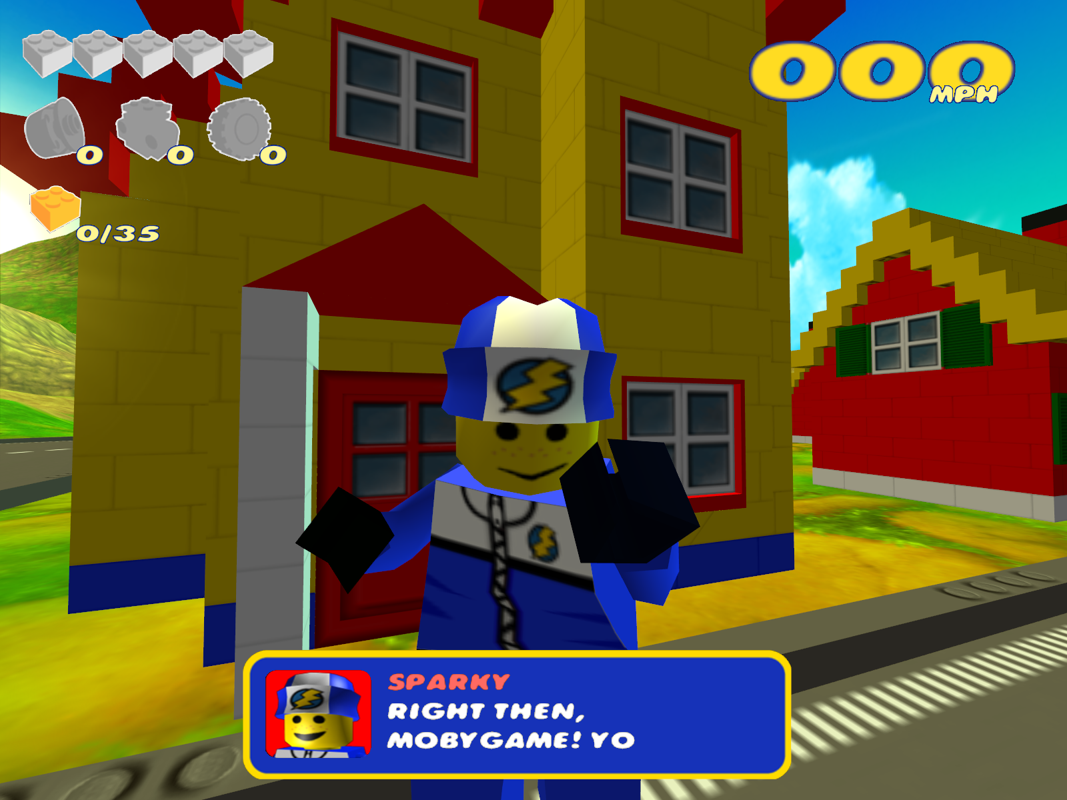 LEGO Racers 2 (Windows) screenshot: Sparky is your guide in Sandy Bay.