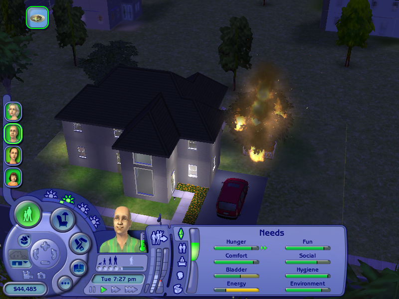 The Sims 2: FreeTime (Windows) screenshot: The tree is on fire!