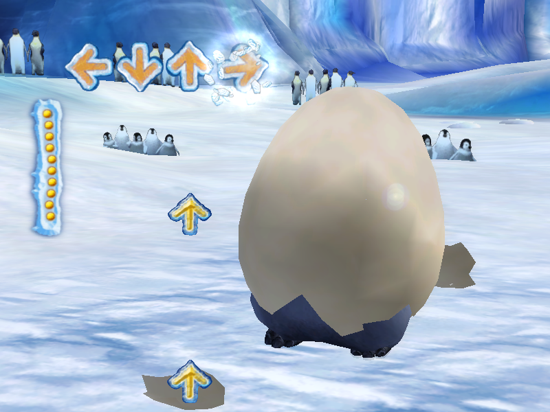 Happy Feet (Windows) screenshot: Clicking the correct arrow keys to keep the beat begins to shatter this penguin egg