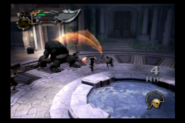 God of War (PlayStation 2) screenshot: Kratos slicing up a cyclops.