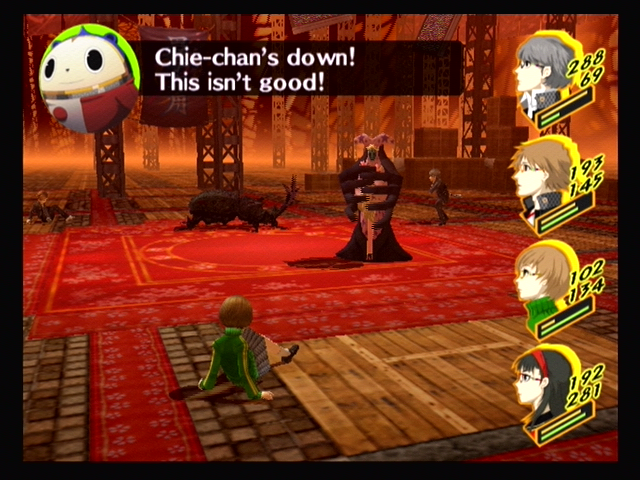 Shin Megami Tensei: Persona 4 (PlayStation 2) screenshot: Chie has been knocked down in battle