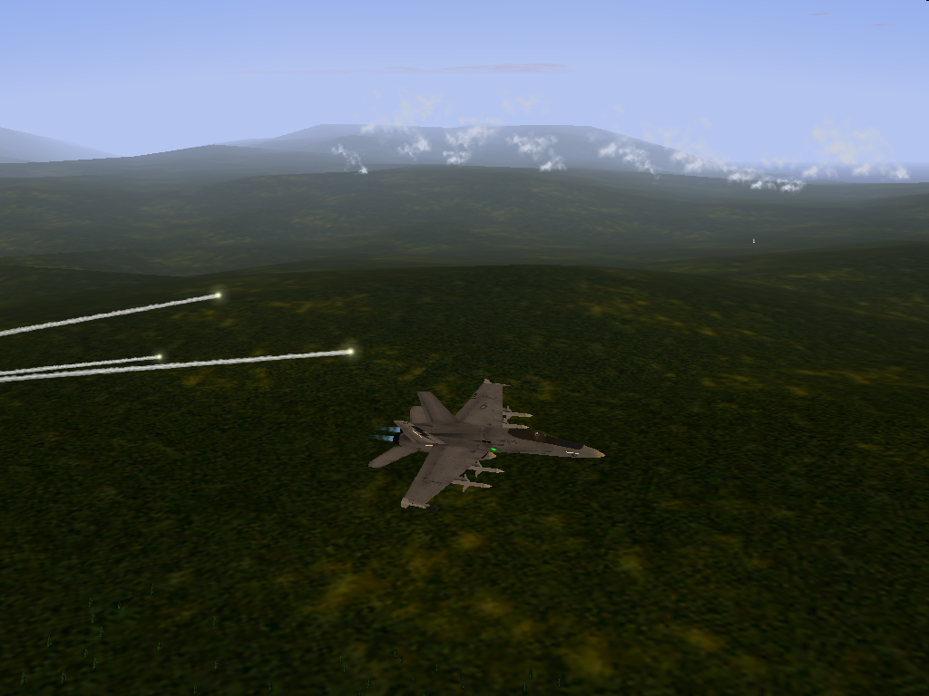 F/A-18 Precision Strike Fighter (Windows) screenshot: Dropping flares and trying to avoid the incoming missile.