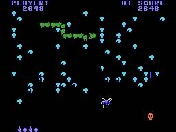 Centipede (ColecoVision) screenshot: The centipede makes its way down the screen