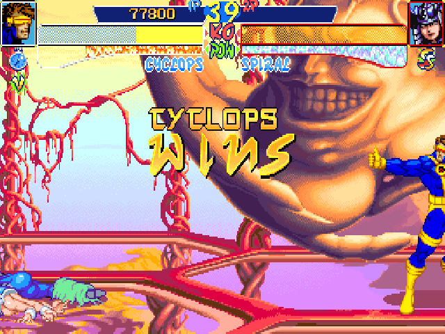 X-Men: Children of the Atom (DOS) screenshot: Under the portrait, some symbols show how a won round had ended. A clock means a time victory, a V means the finishing move was a simple blow, a Ss round ended with an Hyper X move.