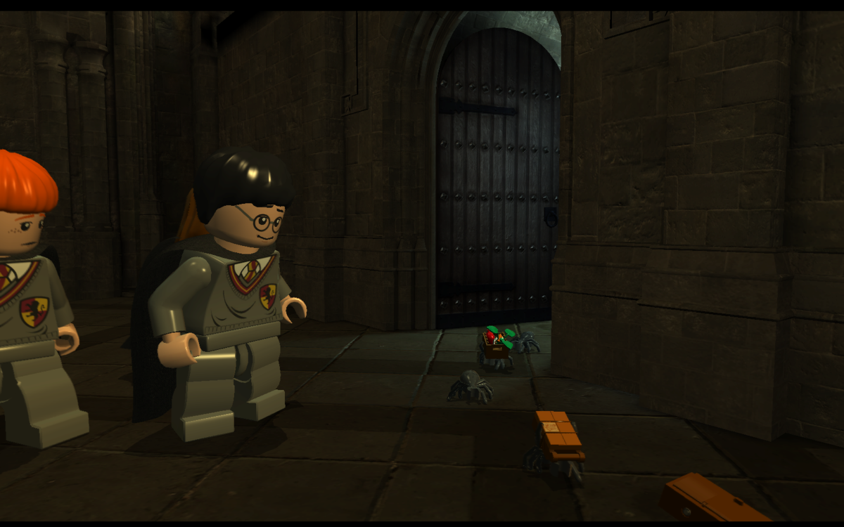 LEGO Harry Potter: Years 1-4 (Windows) screenshot: Spiders seem to be packing up and moving out of Hogwarts.