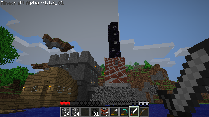 Minecraft (Windows) screenshot: My lighthouse is almost finished and nearly touches the clouds.