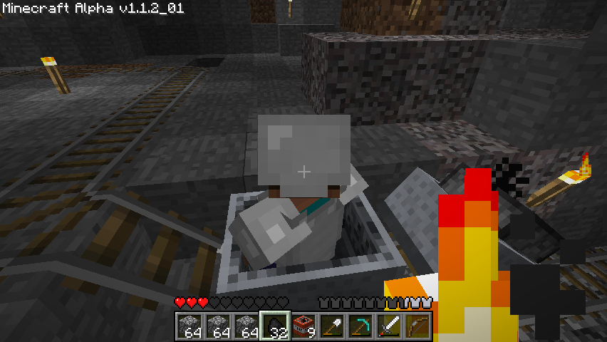 Minecraft (Windows) screenshot: Riding my mine cart.