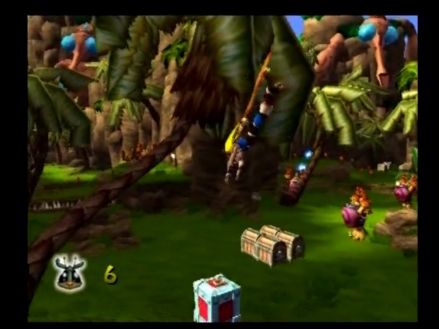 Jak and Daxter: The Precursor Legacy (PlayStation 2) screenshot: Collecting scout flies from the red crates.
