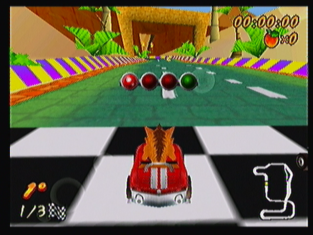 Crash Bandicoot Nitro Kart 3D (Zeebo) screenshot: Starting a new race. The screen displays at the bottom left your place and the lap counter. At the upper right the race time and Wumpa fruit counter. At the bottom right, the track map.