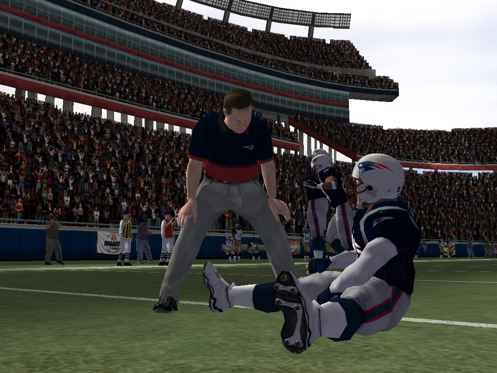 Madden NFL 2003 (Windows) screenshot: Bill Belichick consults a player during pregame warm-ups.