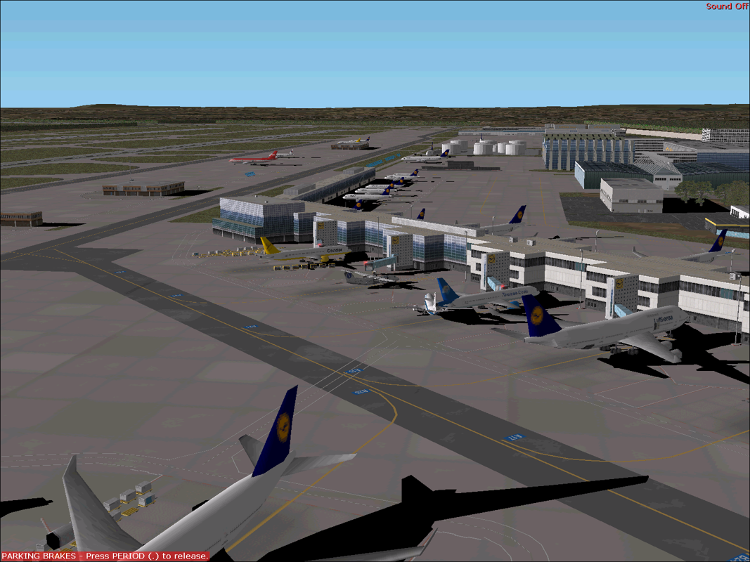 Dash 8-300 Professional (Windows) screenshot: A detailed view of Frankfurt airport with Microsoft Flight Simulator 2002 default scenery in the background