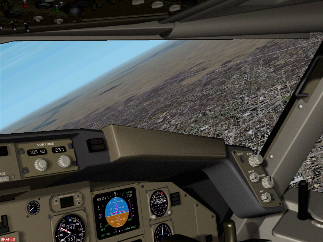 American Airlines (Windows) screenshot: The Boeing 757 (retro version) cockpit view out of the co-pilots window. Other views around the cockpit are available