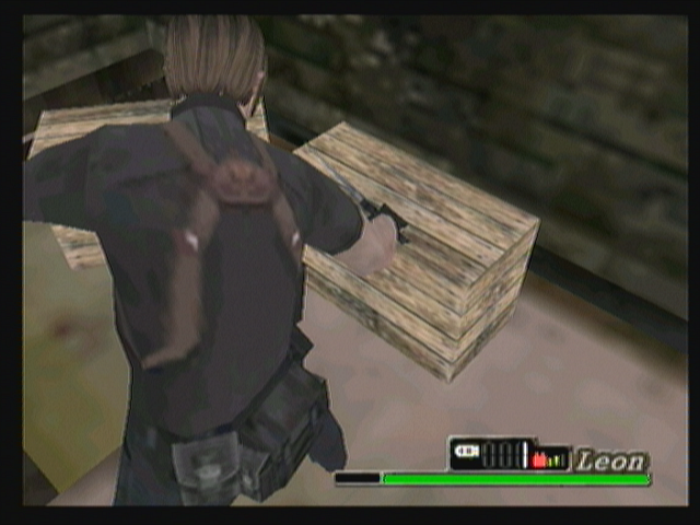 Resident Evil 4: Mobile Edition (Zeebo) screenshot: Using the knife to break a crate.