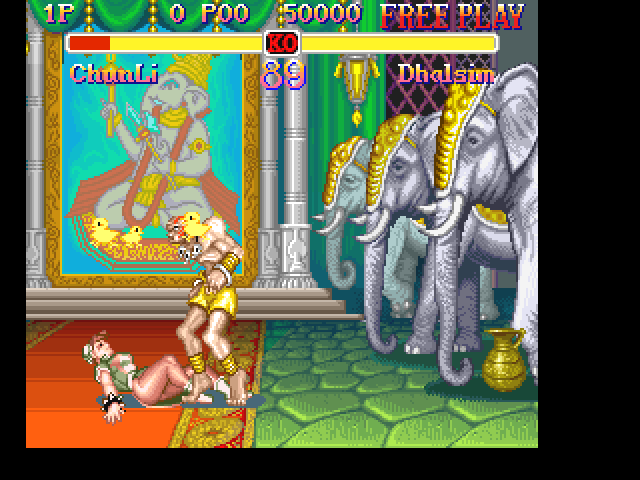 Super Street Fighter II (FM Towns) screenshot: Ouch. This is not the way to treat a woman, Dhalsim. What would Ganesha say?..