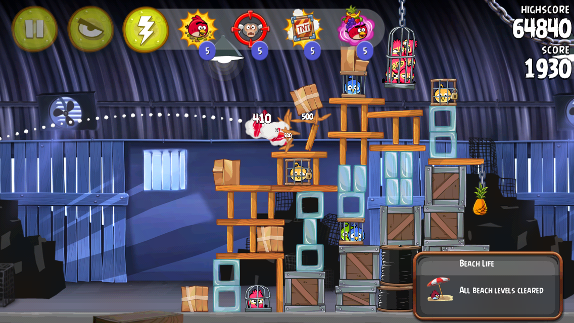 Angry Birds: Rio (iPhone) screenshot: A bird causing some destruction