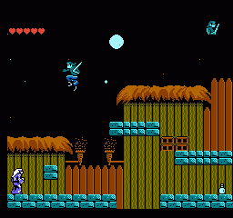Challenge of the Dragon (NES) screenshot: Attacking a wizard in the village level