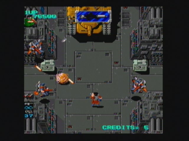 Heavy Barrel (Zeebo) screenshot: This orange ball is yet another granade powerup.