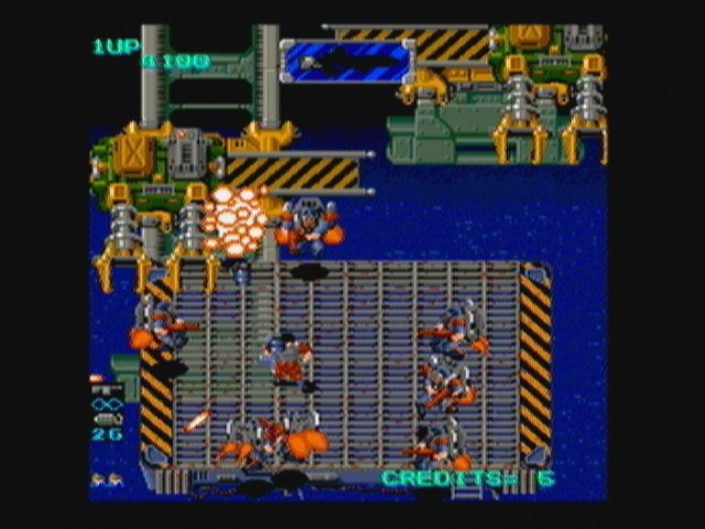Heavy Barrel (Zeebo) screenshot: Remember the second boss? Well, here's two of it, plus a lot of jet-pack guys, all at once. This is arcade gaming at its best, kids.