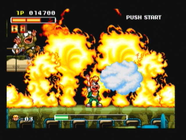 Spinmaster (Zeebo) screenshot: Using the fire bomb attack against the first boss.