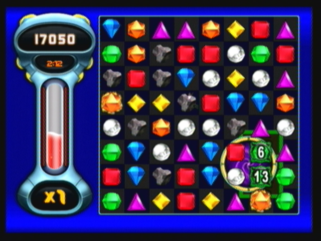 Bejeweled: Twist (Zeebo) screenshot: Playing the Blitz mode. In this mode you have to score as many points as you can before the time runs out (measured by the red meter to the left).
