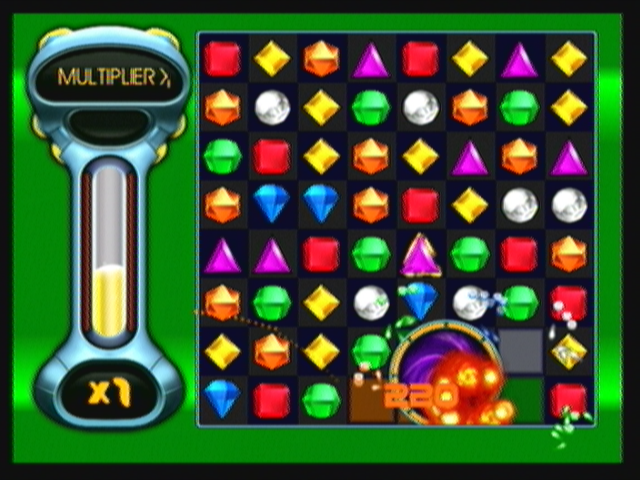 Bejeweled: Twist (Zeebo) screenshot: Exploding a Flame Gem.
