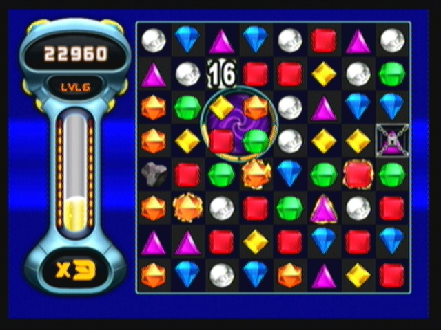 Bejeweled: Twist (Zeebo) screenshot: A Locked Gem has appeared. It can't be rotated and can only be removed by being matched.