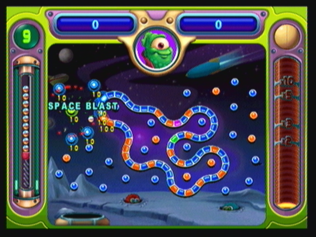 Peggle (Zeebo) screenshot: Stage 5 has Splork as a new player. His special power is the "Super Blast", which lights up all pegs nearby the green one.