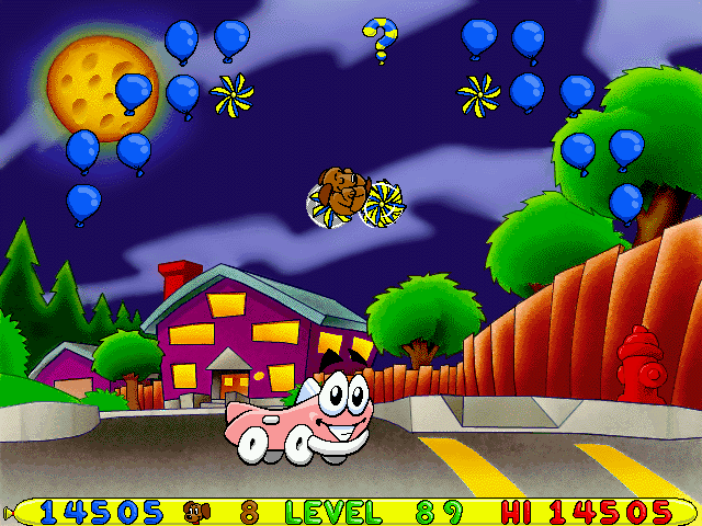 Putt-Putt and Pep's Balloon-o-Rama (Windows) screenshot: Putt-Putt can change his colors by dropping paint buckets - and there are even two colors available which aren't found in the adventure games: gray and pink.
