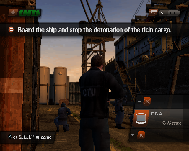 24: The Game (PlayStation 2) screenshot: The first mission is a tutorial so helpful messages appear on-screen. Here it's just begun. Jack, the player, is on the dock and must board the ship