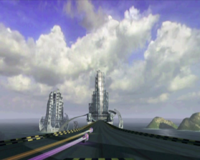 XGIII: Extreme G Racing (PlayStation 2) screenshot: The game's licensing screen is followed by an animated race sequence in which the text "In A Race Where Losing Is Not An Option/The Only Way To Survive/Is To Display On Two Wheels" is displayed